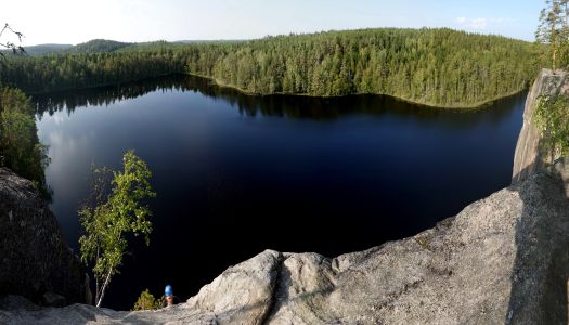Olhavanvuori - horolezec dolézá na vrchol.